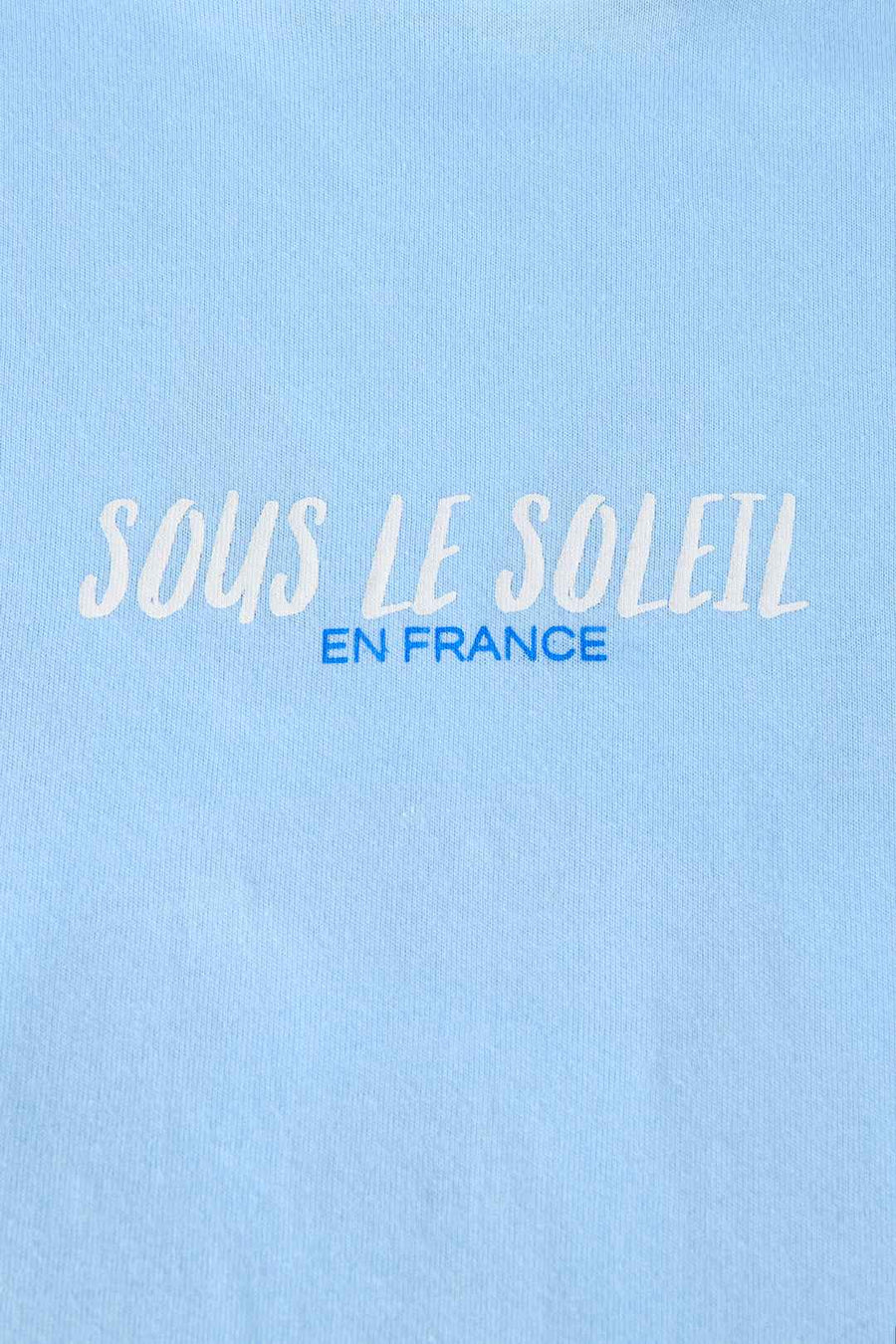 Dames T-shirt “Sous Le Soleil” – Roze & Lichtblauw Katoen